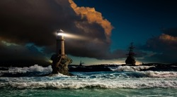 Storm At Sea Overlooking The Lighthouse And Ships. Lighthouse Tourlitis Of Chora, Andros Island, Cyclades, Greece