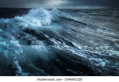 Storm at sea with sky big waves and white foam - Shutterstock ID 1544691320