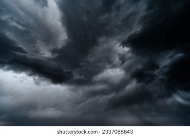 storm sky, dark dramatic clouds during thunderstorm, rain and wind, extreme weather, abstract background
