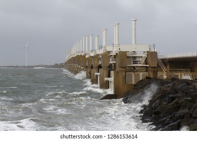 Storm surge barrier to protect against flood and storm with big waves