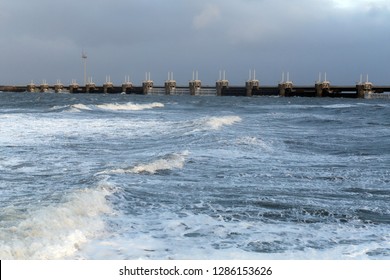Storm surge barrier to protect against flood and storm with big waves in front
