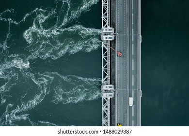 Storm Surge Dam Venting Water During High Tide