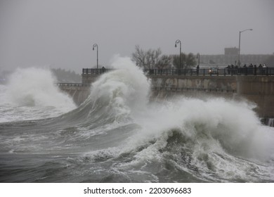 Storm Waves Batter Sea Wall