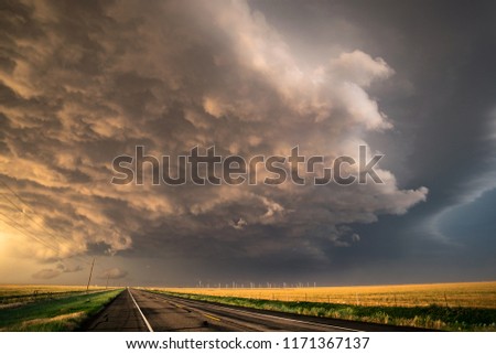 Stormclouds crossing the road. Dramatic sky of a supercell thunderstorm in northwest Texas.