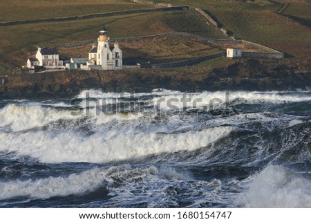 Stormy Atlantic Pentland Firth area with huge waves near Scrabster Lighthouse near Thurso in Caithness, Scotland
