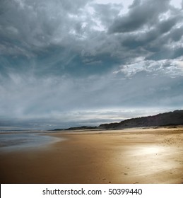 Stormy Beach With Dark Clouds