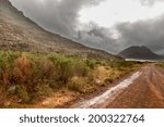 Stormy clouds settling down on the tall mountains of the picturesque landscapes of the Western Cape regions of South Africa