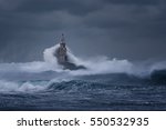 Stormy cloudy day. Dramatic sky and huge waves at the Lighthouse, Ahtopol, Bulgaria