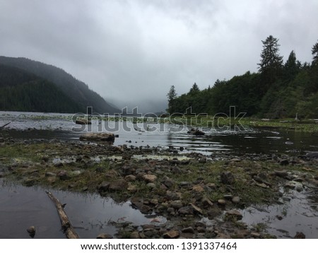 Stormy day in Haida Gwaii. Picture of a still fresh water lake. 