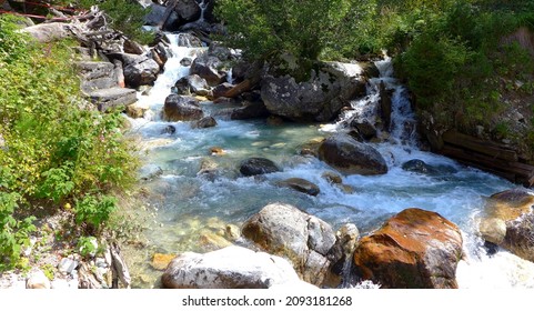 Stormy Mountain River On A Sunny Sunny Day. Stones. Top And Side View