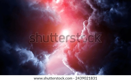 Stormy Rain Clouds Background with a Light