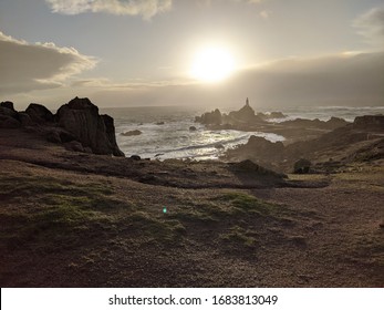 Stormy Sea With Lighthouse After Storm Passing