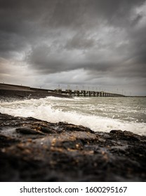 Stormy sea at the Oosterscheldekering, a 9km long storm surge barrier that is part of the Dutch Delta Water Works.
