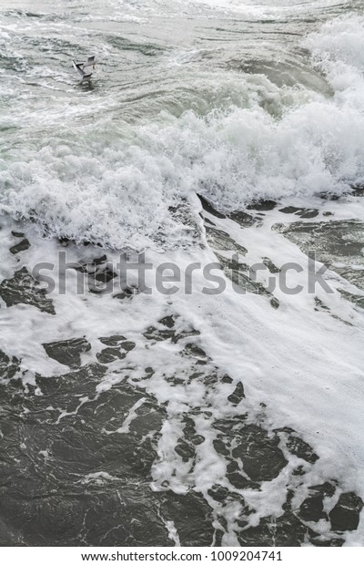 stormy sea water surface with foam and waves\
pattern, background photo\
texture\
