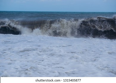 Stormy Sea Waves Breaking Near The Coast