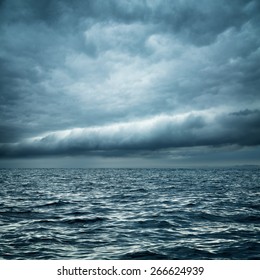 Stormy Sea. Wild Nature Dark Background. Toned and Filtered Photo. Copy Space.