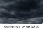 stormy sky, dark dramatic clouds, thunderstorm, rain and wind, extreme weather, abstract background
