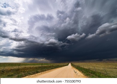 Stormy sky and dirt road