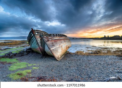 Stormy sunrise over abandoned fishing boats at Salen on the Isle of Mull in Scotland - Powered by Shutterstock