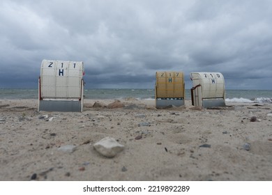 Stormy weather at the Baltic Sea on the beach with empty beach chairs - Powered by Shutterstock
