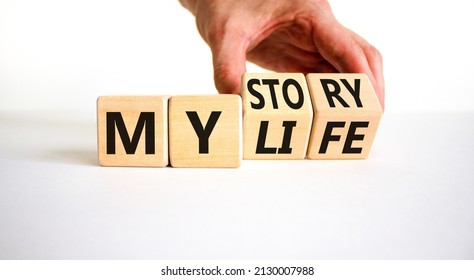 Story of my life symbol. Businessman turns wooden cubes and changes concept words My story to My life. Beautiful white table white background. Business story of my life concept. Copy space.
