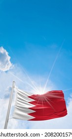 Story size flag image with text area. Bahrain flag. Bahrain flag in front of sky. Flag of Bahrain