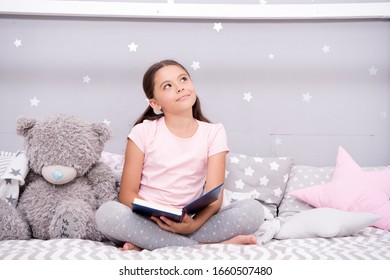 Story That Grabs Imagination. Little Girl Read And Imagine. Cute Dreamer With Book And Toy. Kids Imagination And Fantasy. Reading Feeds Imagination. Inspiring Child Imagination.