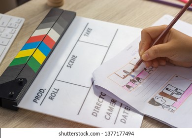 Storyboard drawing with pencil creative sketch cartoon. Storyboarding is process image displayed in sequence for purpose of pre-visualizing motion picture, interactive media. Concept sketching ideas. - Shutterstock ID 1377177494