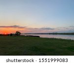 Stoughton dam with sunset on the horizon