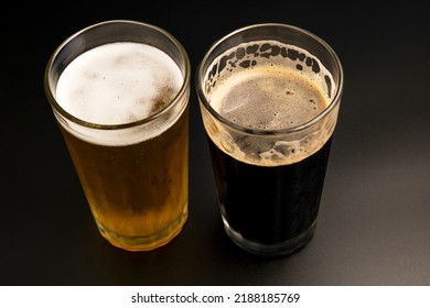 Stout Beer And Lager Beer On Dark Background