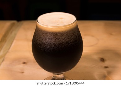 
Stout Craft Beer In A Woden Table