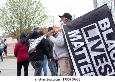 St.Paul, Minnesota, United States, 04-11-2021: Older Black Man Holding A Black Lives Matter Sign, During The George Floyd And Justin Teigen Protest.