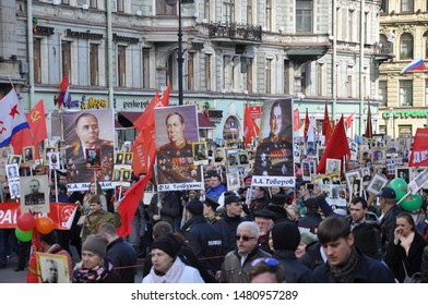 St.Petersburg/ Russia - 05/09/2017: A Parade Of The Great Patronymic War With People Carrying Photos Of Their Relatives Who Took Part In The War 