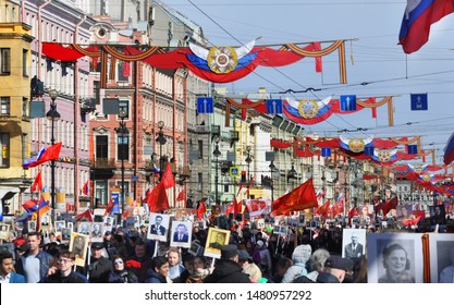 St.Petersburg/ Russia - 05/09/2017: A Parade Of The Great Patronymic War With People Carrying Photos Of Their Relatives Who Took Part In The War 