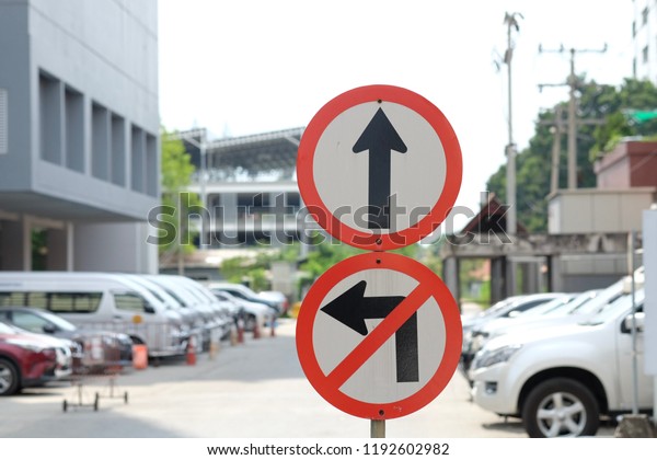 Straight ahead sign and\
No turn left sign.