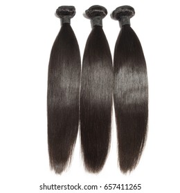 Straight black virgin remy human hair extensions bundles  - Shutterstock ID 657411265