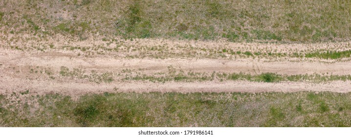 Straight dirt road aerial view