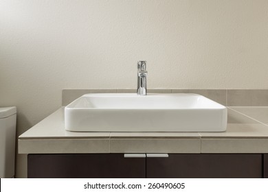 Straight On Close Up of Modern Bathroom Sink 