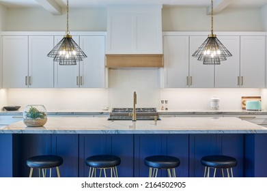 Straight on view of contemporary kitchen - Shutterstock ID 2164502905