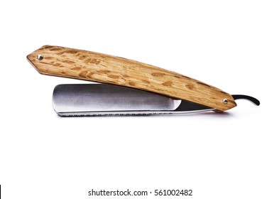 Straight razor with a wooden handle on a white background insulated