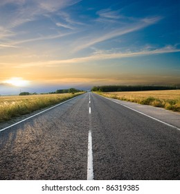 Straight Road And Colorful Sunset