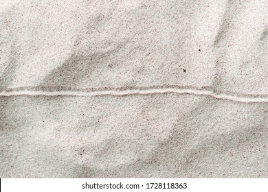 straight trending line chart drawn in the wet sand sunlit beach  Ideal as illustration concepts related to stability business services 