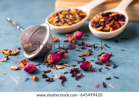 Strainer for brewing tea, different types of tea, spices and dried roses