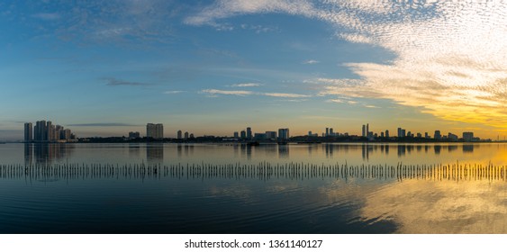 Straits Of Johor Sunrise Blue Sky Dramatic Clouds Panorama