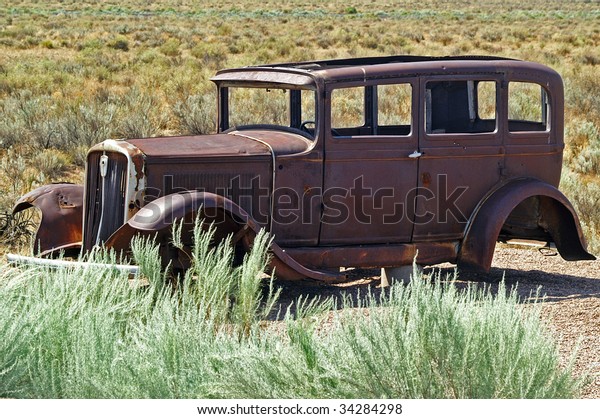 Stranded - Abandoned car in\
the desert