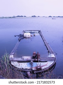 A Stranded Boat Full Of Water 