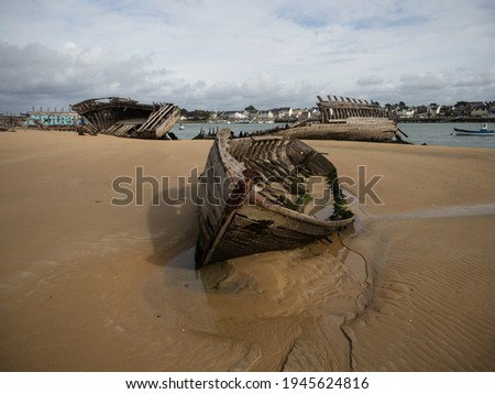 Stranded broken wooden shipwrecks on fishing boat ship naval graveyard marine cemetery in Magouer Etel river Quiberon Lorient Morbihan Brittany France Europe