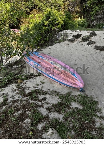 Stranded canoo by the beach