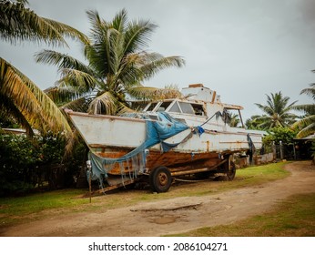 Stranded Fishing Boats In The Backyard. Moorea, French Polynesia, Tahiti