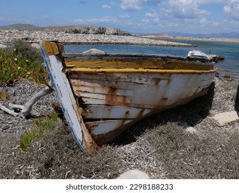 Stranded wooden fishing boat from Greece